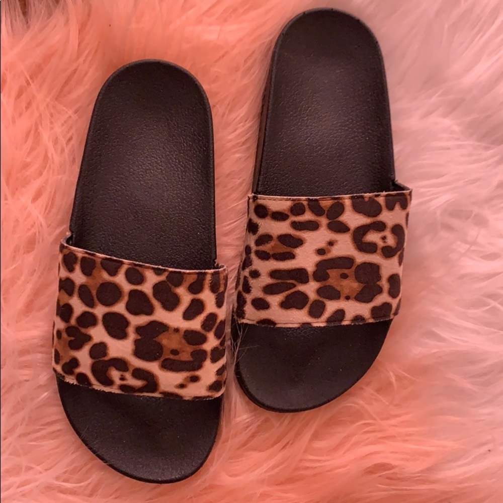 Leopard pool slides